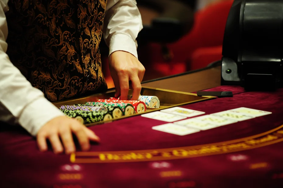 What are the legal consequences for a casino dealer who steals chips in Singapore?